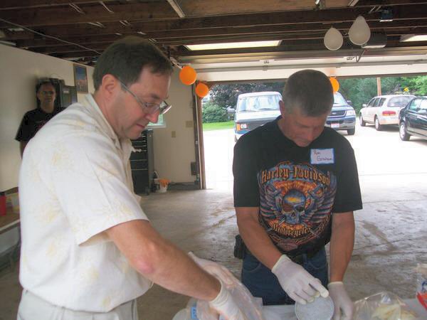 Billy McGurk and Ron Graham making burgers Billy McGurk and Ron Graham making burgers